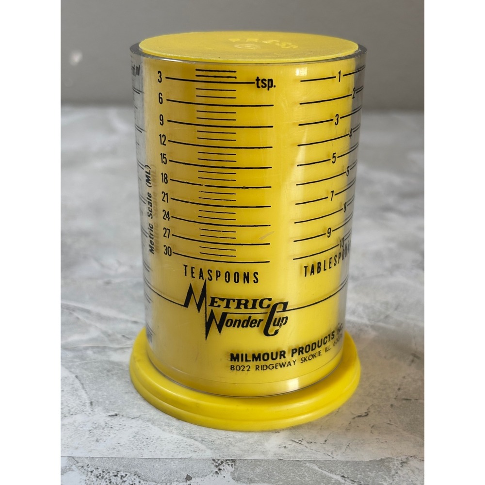 Vintage Metric Wonder Cup Adjustable Measuring Cup Milmour Products One Cup